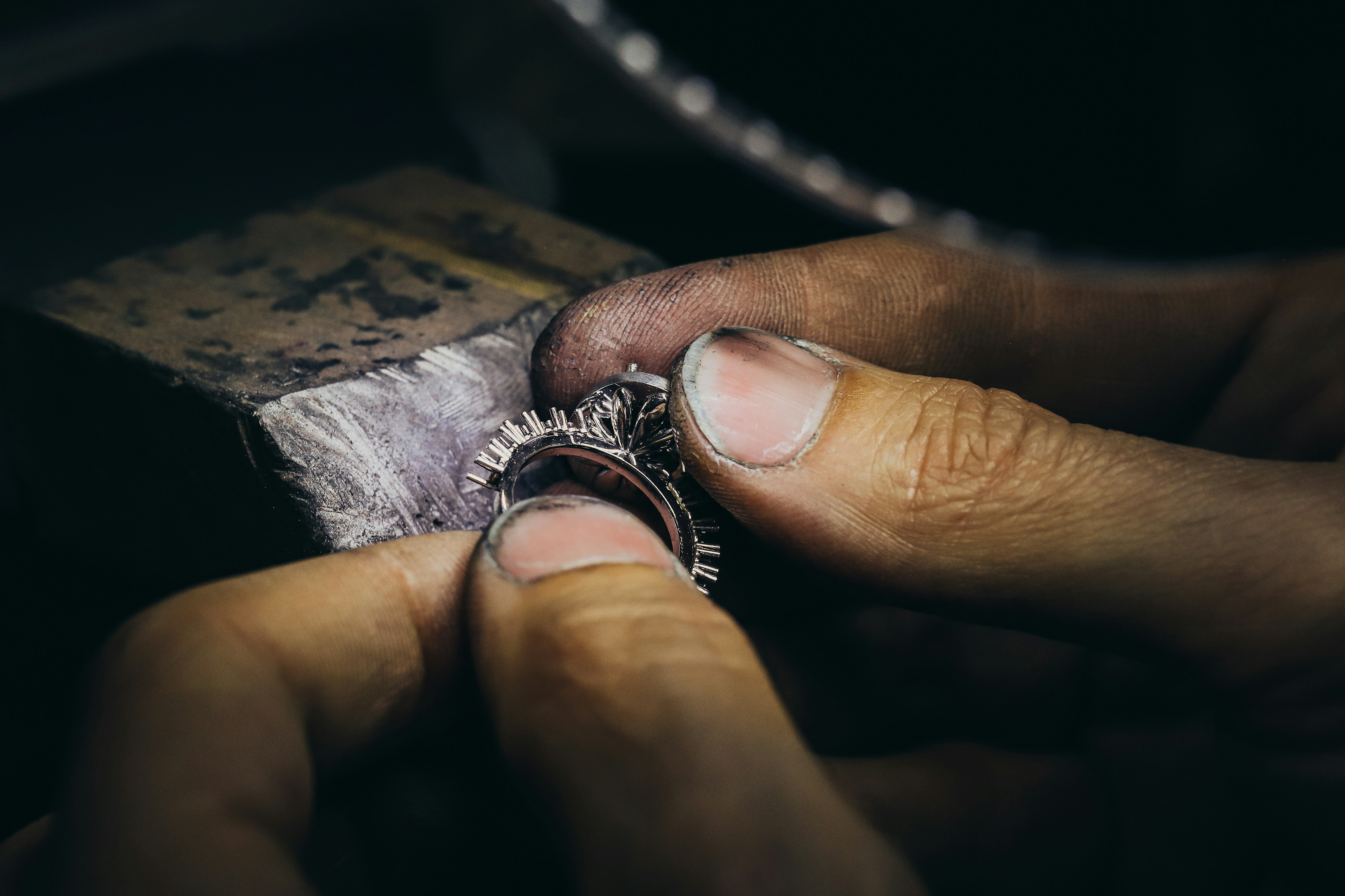 Jeweler crafting gold jewelry at Strong Gold